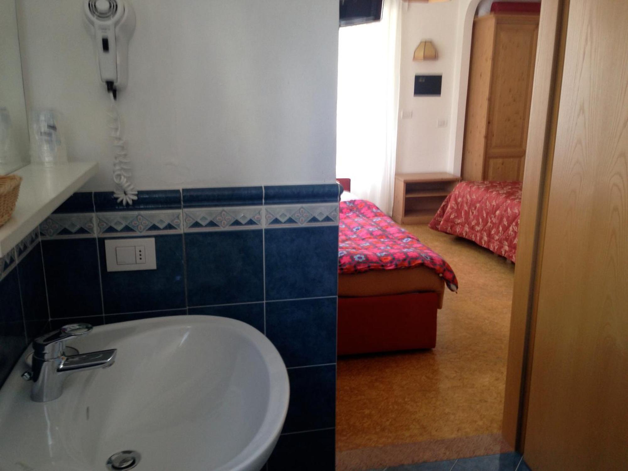 Liz Hotel & Apartments Predazzo Habitación foto